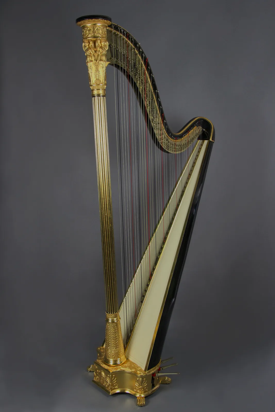 Restored antique Erard Gothic harp with gilded detail