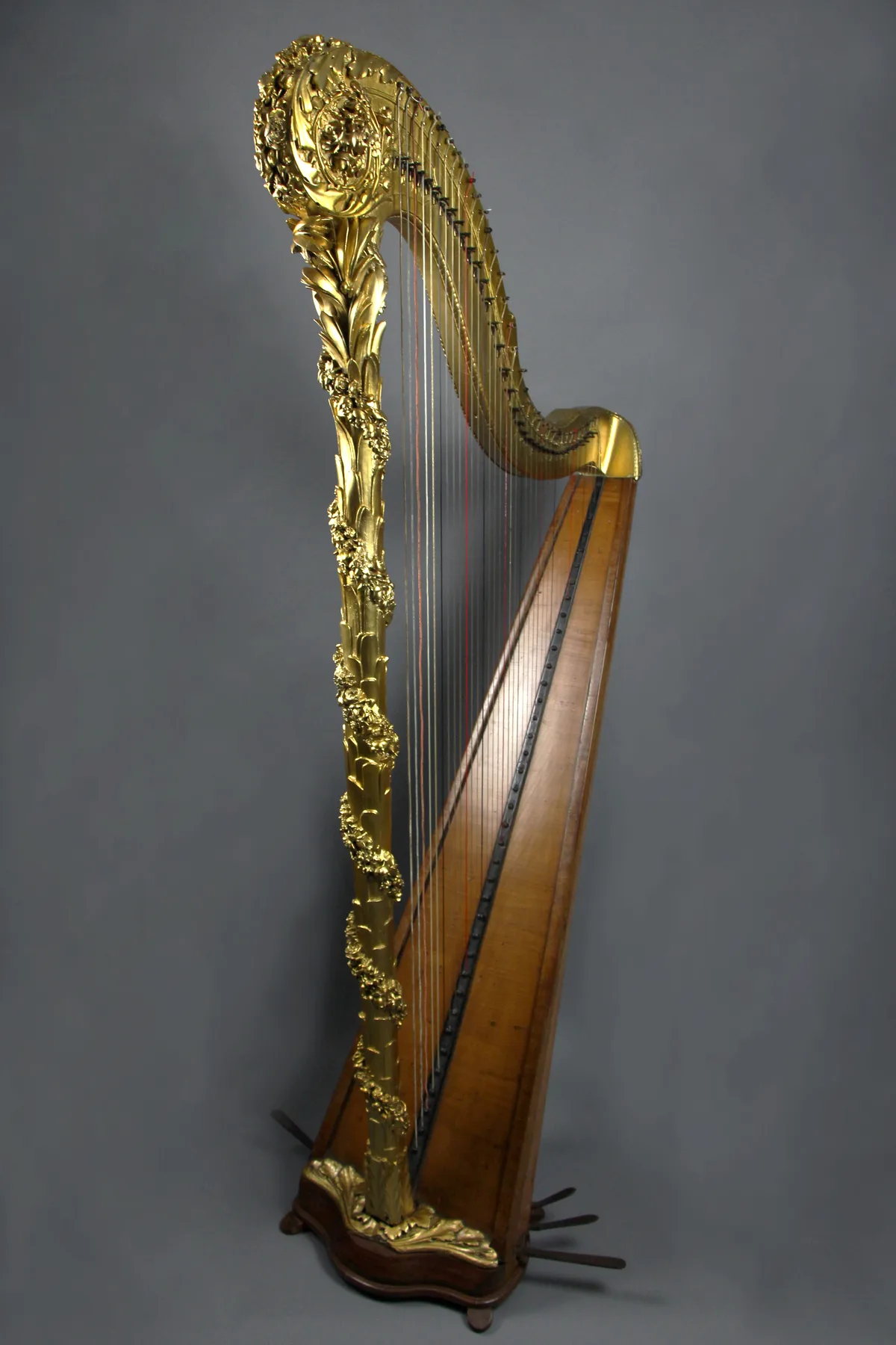 A fully restored gilded antique harp